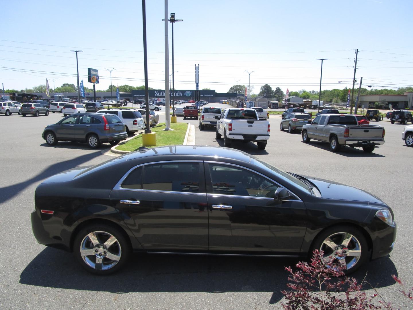 2012 BLACK /Black/Cloth Chevrolet Malibu (1G1ZF5E72CF) , located at 1814 Albert Pike Road, Hot Springs, AR, 71913, (501) 623-1717, 34.494228, -93.094070 - Photo#4